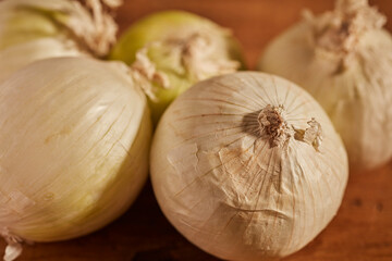 Whole, raw, white onions. A typical ingredient in Mexican cookery