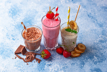 Milkshake from strawberry, banana and chocolate