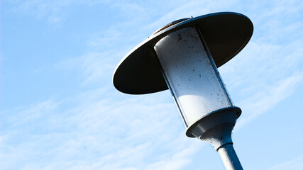 Modern Smart LED Street Lamp Against Blue Sky – Urban Energy-Efficient Outdoor Smart City...