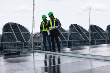 Professional engineer team check new solar roof project , green and renewable energy supply for...