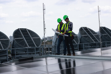Professional engineer team check new solar roof project , green and renewable energy supply for...