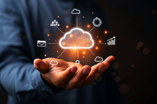 Man holding glowing cloud network with icons representing data and business growth