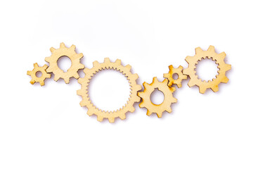 Wooden cogwheels on white background	
