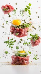 Multiple Beef Tartars with Egg and Herbs in Floating Display