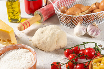 Ingredients for cooking Fried and pizza pastry with minced meat on light background.