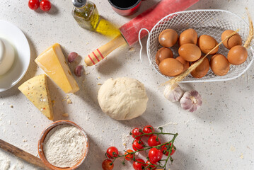 Ingredients for cooking Fried and pizza pastry with minced meat on light background, top view.