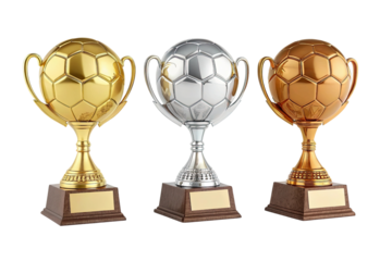 Gold silver and bronze soccer trophies with wooden bases isolated on transparent background