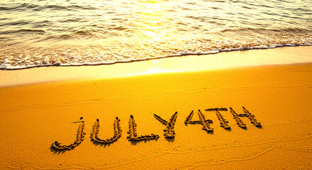 July fourth written in the sand on a beach with ocean waves and sunset in the background at golden hour