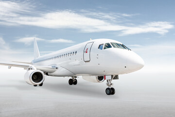 White passenger aircraft isolated on bright background with sky