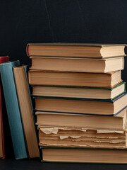 Various vintage books arranged neatly, showcasing the textures of aged paper, bindings, and literary history over time. 