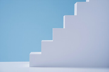 Fototapeta premium Minimalist white staircase ascending against a soft blue background with copy space