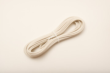 A coil of copper wire. Bundles of connecting wires.