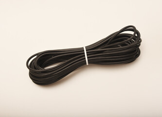 A coil of copper wire. Bundles of connecting wires.