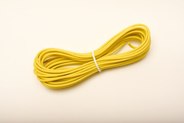 A coil of copper wire. Bundles of connecting wires.
