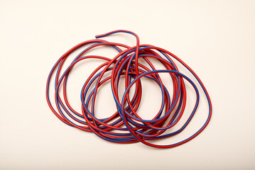 Bundles of copper connecting wires in rubber insulation. Multicolored wires.