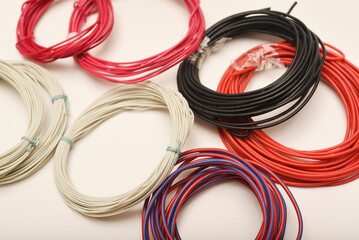 Bundles of copper connecting wires in rubber insulation. Multicolored wires.