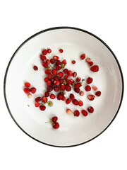 Wild berries. Plate with strawberries..
