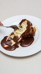 Delicious and Indulgent San Sebastian Cheesecake with Rich Chocolate ganache Topping for Dessert Lovers