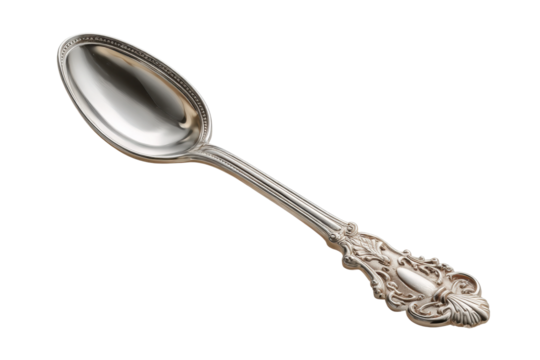PNG Elegant vintage silver spoon with intricate ornamental design