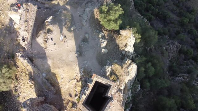 Aerial view of ancient hillside ruins near the Gulf of Edremit, possibly from the antiquity period