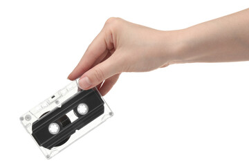 Woman with audio cassette on white background, closeup