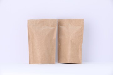 Zipper stand-up pouches on white background. Mockup for design