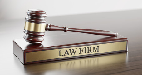 Law Firm: Judge's Gavel as a symbol of legal system and wooden stand with text word