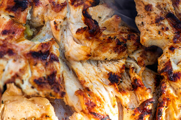 Pork chops, steak, sausages on barbecue grill