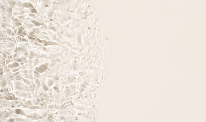 Beige Abstract water background texture with ripples and waves