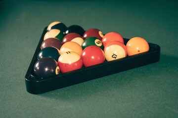 Pool balls racked on table