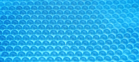 Blue hydrogel balls in geometric perspective. Polymer gel. Silica gel. Crystal liquid ball with...
