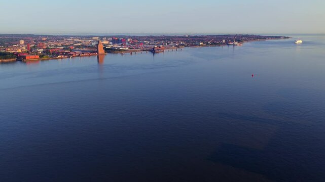 Aerial video featuring Birkenhead docks in the morning from the vantage point of Liverpool. 