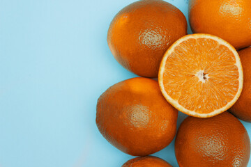 Cutten orange on top of other oranges