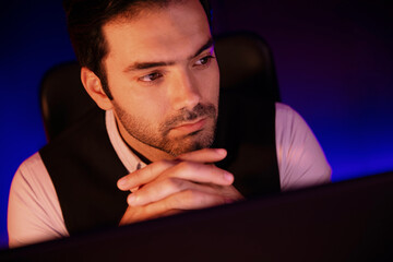 Portrait feeling bored businessman waiting analyzing market data or e-mail sending back to customer...