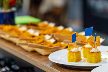 Gourmet restaurant counter with cornbread snacks and catering food