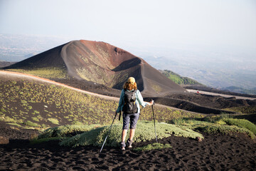 hiker trekking on mount Etna