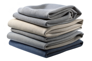 Stack of neatly folded knit sweaters in various shades of grey and beige isolated on transparent background