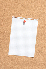Blank grid paper sheet pinned on cork board. Template Mock up