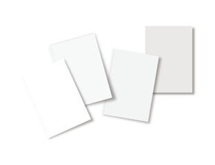 Minimalist top view of four blank books arranged on gray background, perfect for mockups, publishing, and editorial design concepts.