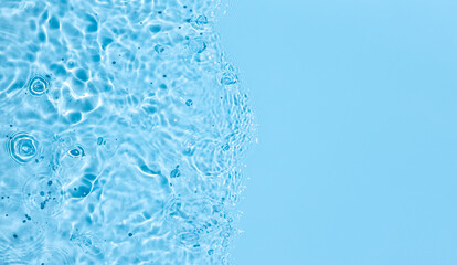 Blue Abstract water background texture with ripples and waves