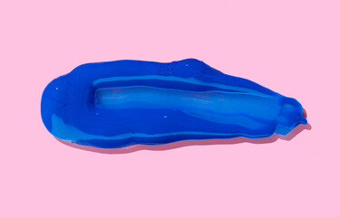 Blue paint Brush Stroke isolated on pink background