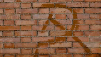 hammer and sickle symbol on a wall