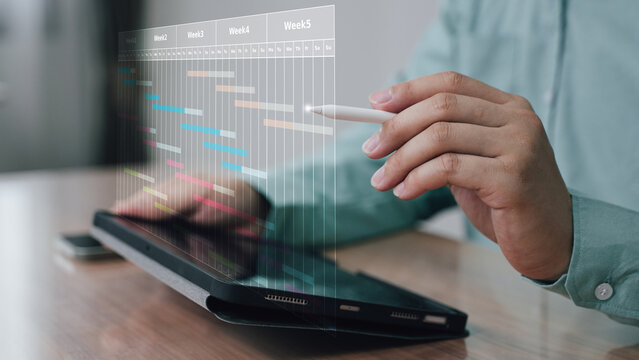 Digital Timeline and Project Management Interface, business professional interacting with a digital timeline on a tablet, representing project planning, schedule tracking, and AI-powered management.
