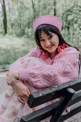 Pink summer mood of a girl with sincere emotions