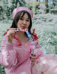 Pink summer mood of a girl with sincere emotions