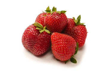 Fresh group of berries isolated on a white background.