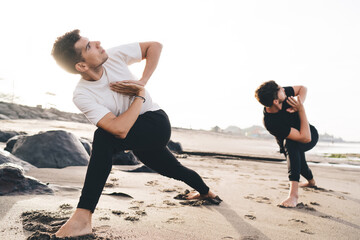 Pair of mindfulness-driven professionals meditating on rocks, visualizing mental AI training, syncing breath with neural nets, optimizing focus and digital cognition in work-from-nature settings.