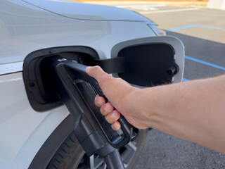 Point of view of an electric vehicle charging