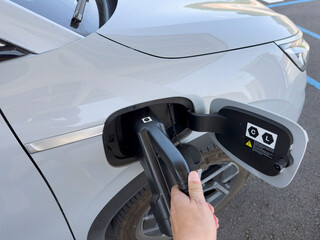 Point of view of an electric vehicle charging