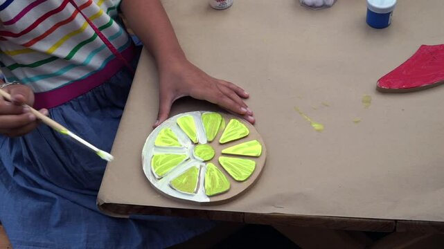 woman with lemon paint